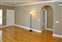 Great Room - Hardwood Floors - Crown Molding - Entry Alcove to Bedroom # 2 and Bath