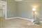 Master Bedroom - Carpet - Crown Molding - View into Walk-in Closet